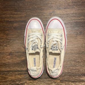 Cream colored slip on converse